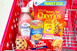 groceries in a red shopping cart