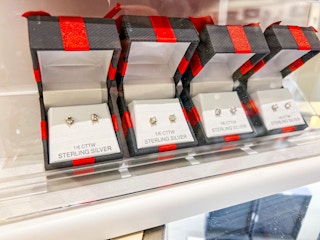display of diamond earrings at macy's