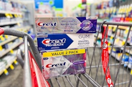 crest brilliance and gum toothpaste in a cart