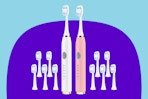 Dnil 2-Pack Adult Electric toothbrushes on a purple background.