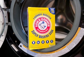 arm and hammer laundry booster super washing soda resting in a washing machine