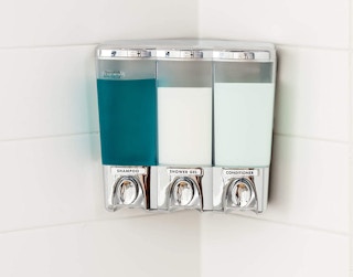 liquid dispensers on a wall