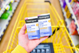 hand holding neutrogena collagen bank moisturizers