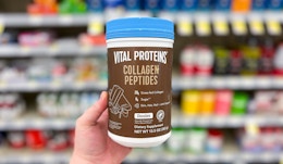 hand holding vital proteins collagen peptide powder