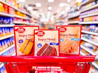 3 betty crocker cake mixes sitting on a target cart
