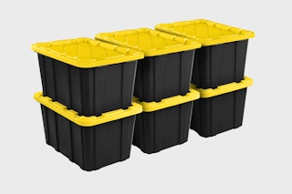Stock image of six Sterilite Storage Bins (27 gallon) black with yellow lids
