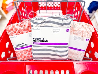 3 sheet sets sitting in a target cart