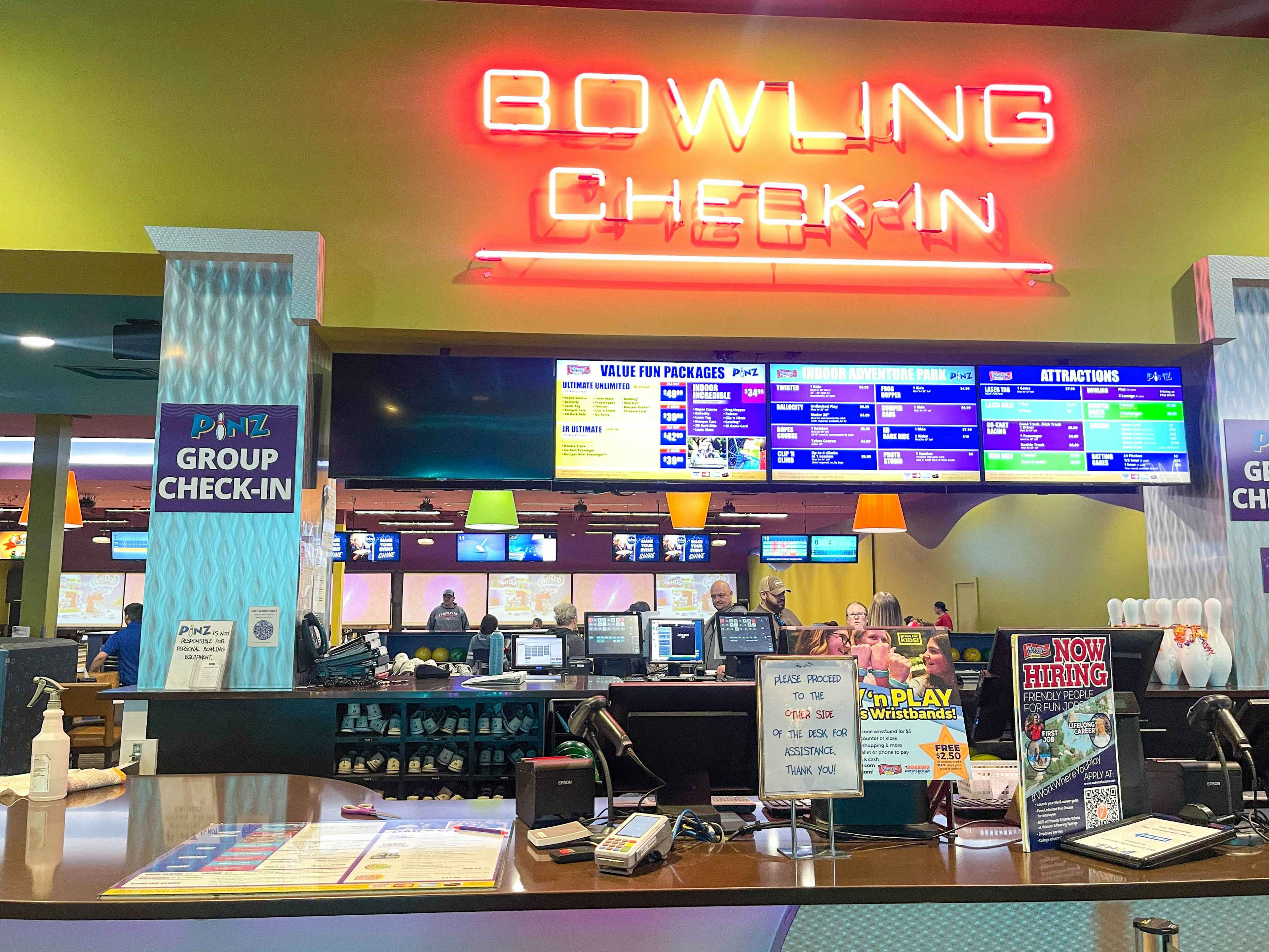 bowling alley check in sign 