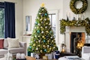 Lifestyle image of the Home Accents Holiday Christmas Tree in home setting