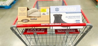 slippers and boots in a cart at costco