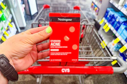 hand holding neutrogena acne patches in cvs
