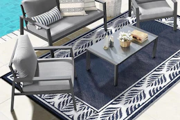 an outdoor rug on a patio