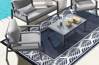 an outdoor rug on a patio