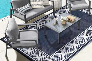 an outdoor rug on a patio