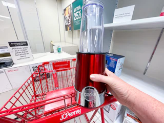 hand holding cook's blender