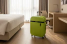 Collapsible Carry On Luggage in a hotel room