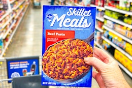 hand holding kroger skillet meal box