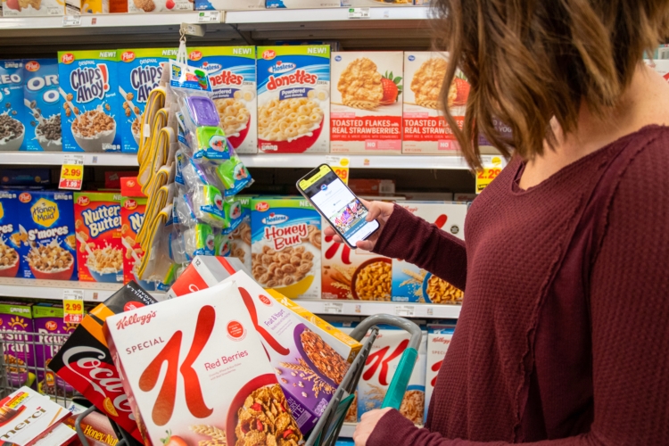 Woman in grocery store looking at cereal