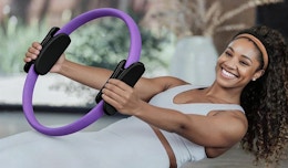 a person doing pilates with a pilates ring