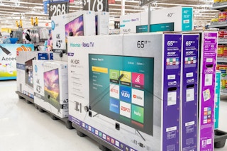 A Hisense TV in a store aisle.