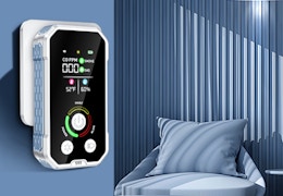 a carbon monoxide detector plugged into a wall