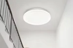 a ceiling light over stairs