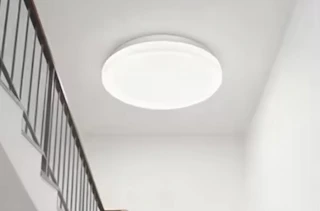 a ceiling light over stairs