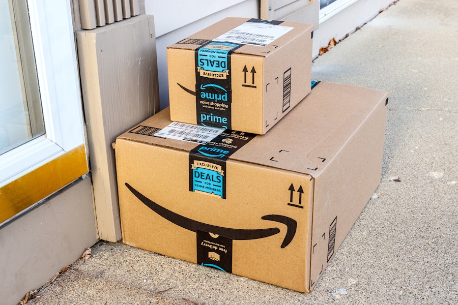 two amazon prime boxes stacked outside