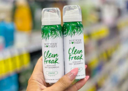 hand holding not your mother's dry shampoo in cvs