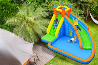 Lifestyle image of Costway Water Slide being used by children outdoors