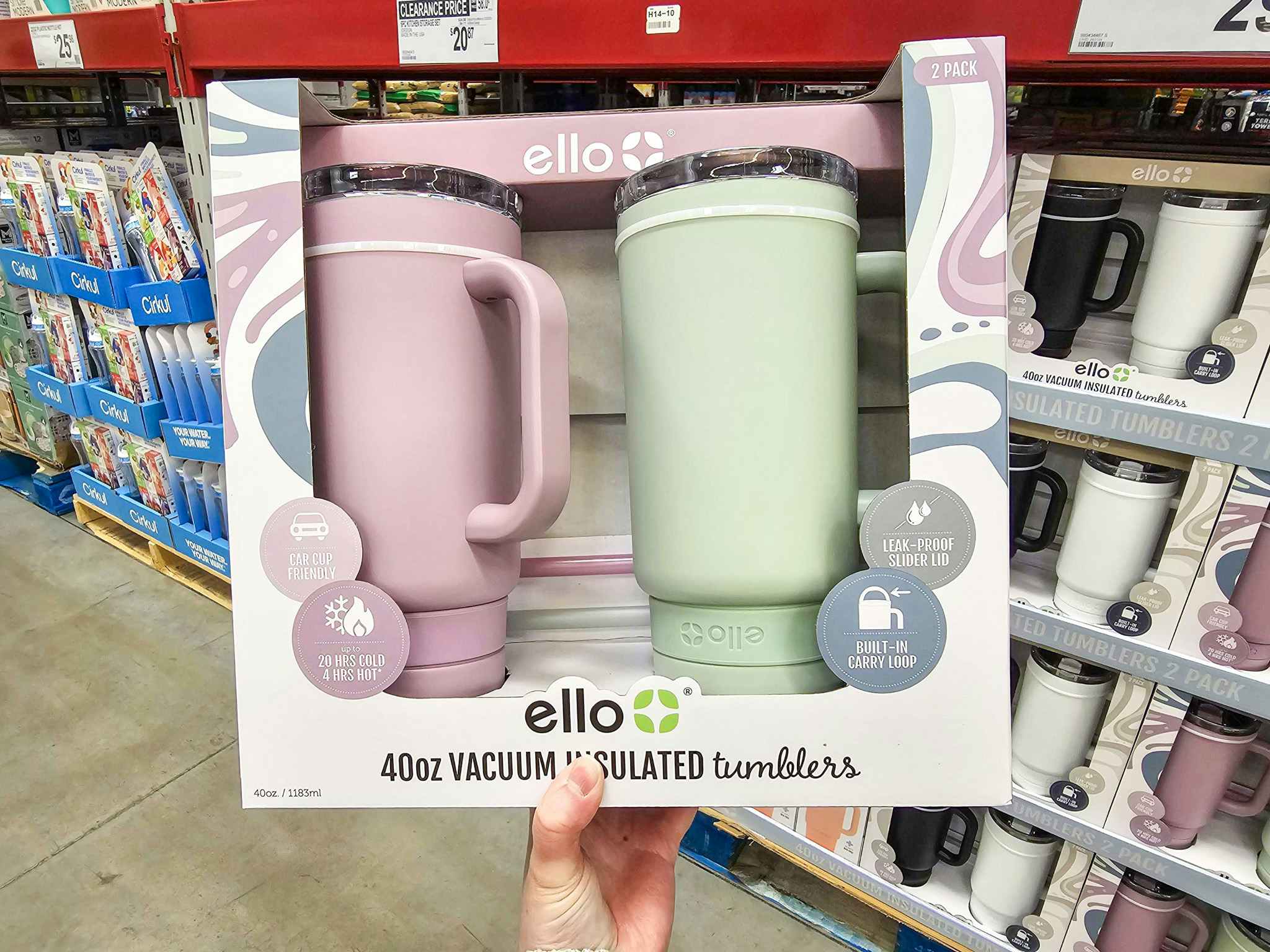hand holding a 2-pack of 40-ounce tumblers