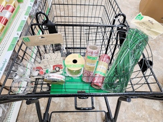 christmas crafting supplies in a cart