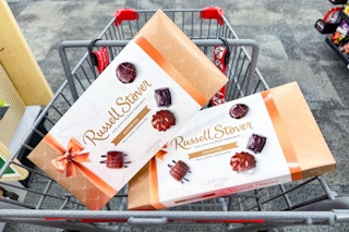2 boxes of russell stover chocolates in a cart