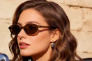 a woman wearing retro sunglasses