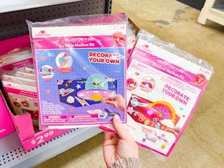 hand holding two way to celebrate mailbox kits at walmart