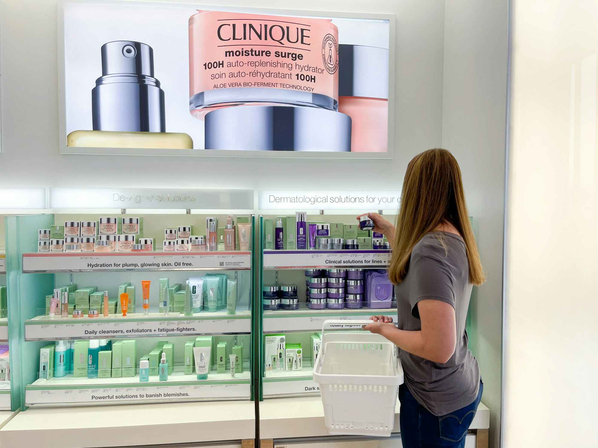 A person shopping the Clinique display at Ulta