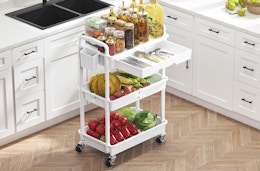 a rolling cart in a kitchen full of sauces and seasonings