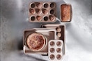 Lifestyle image of the Carote 9 Pc Stackable Nonstick Bakeware Set in the color brown