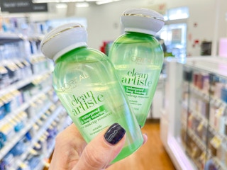 hand holding makeup remover