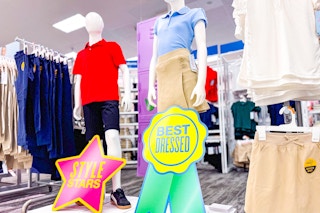 target school uniforms sitting on shelves