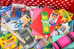 A target shopping cart filled with school supplies 