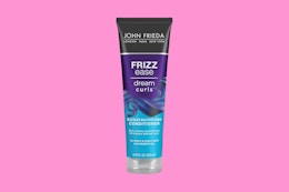John Frieda Curl Conditioner on pink background