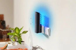 flying insect trap plugged into kitchen outlet