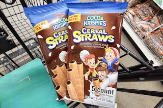 2 packs of cocoa krispies cereal straws in a cart