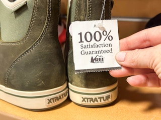 rei guaranteed tag on store