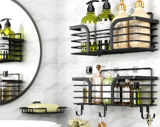 shower shelves on shower wall with various shower essentials