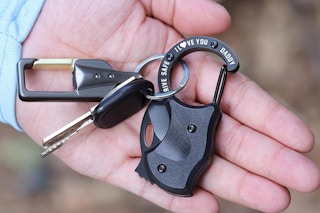 a keychain on a hand
