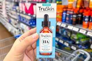Walmart in-store photo of TruSkin HA Serum held over shopping cart