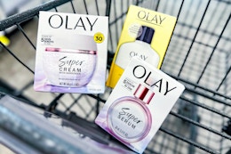 olay super cream, super serum, and moisturizer in a cart