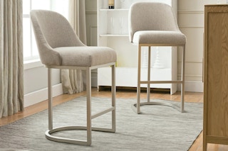 Lifestyle image of two Leick Bar Stools in a oatmeal finish